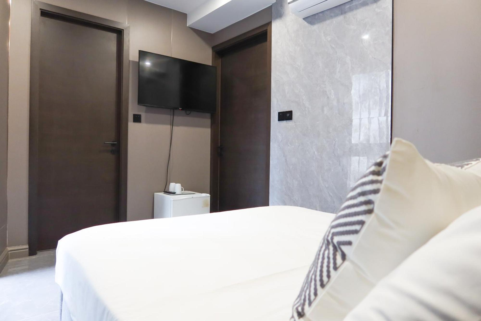 Recharge Studio Apartment & Suites Singapore Værelse billede